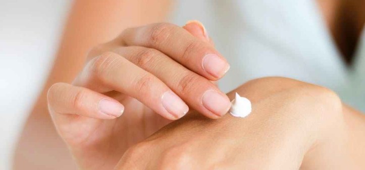 applying body lotion care cosmetic product skincare facial moisturiser cleanser toner beauty