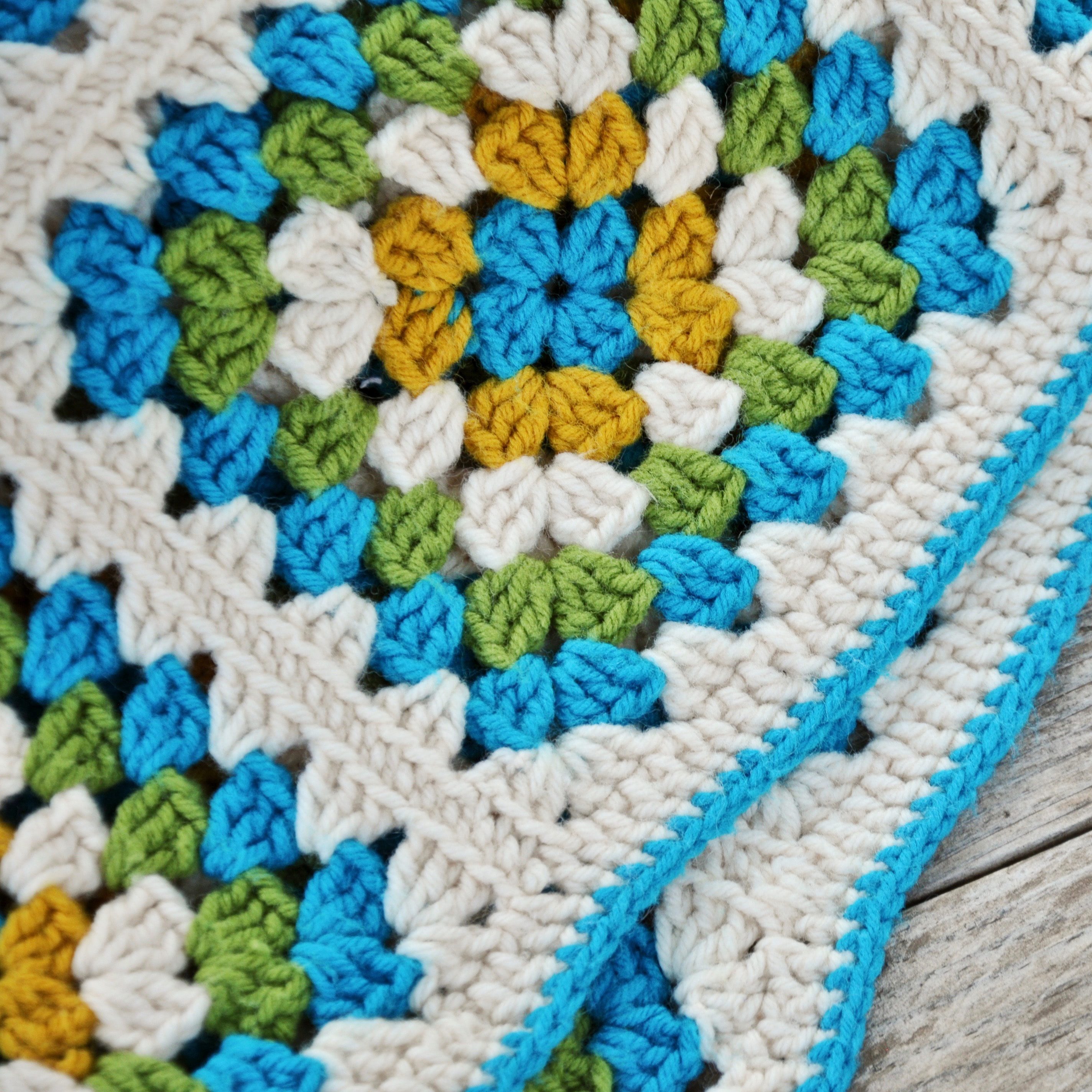 A close up of part of a crochet blanket. (wallflowerhaze.com)