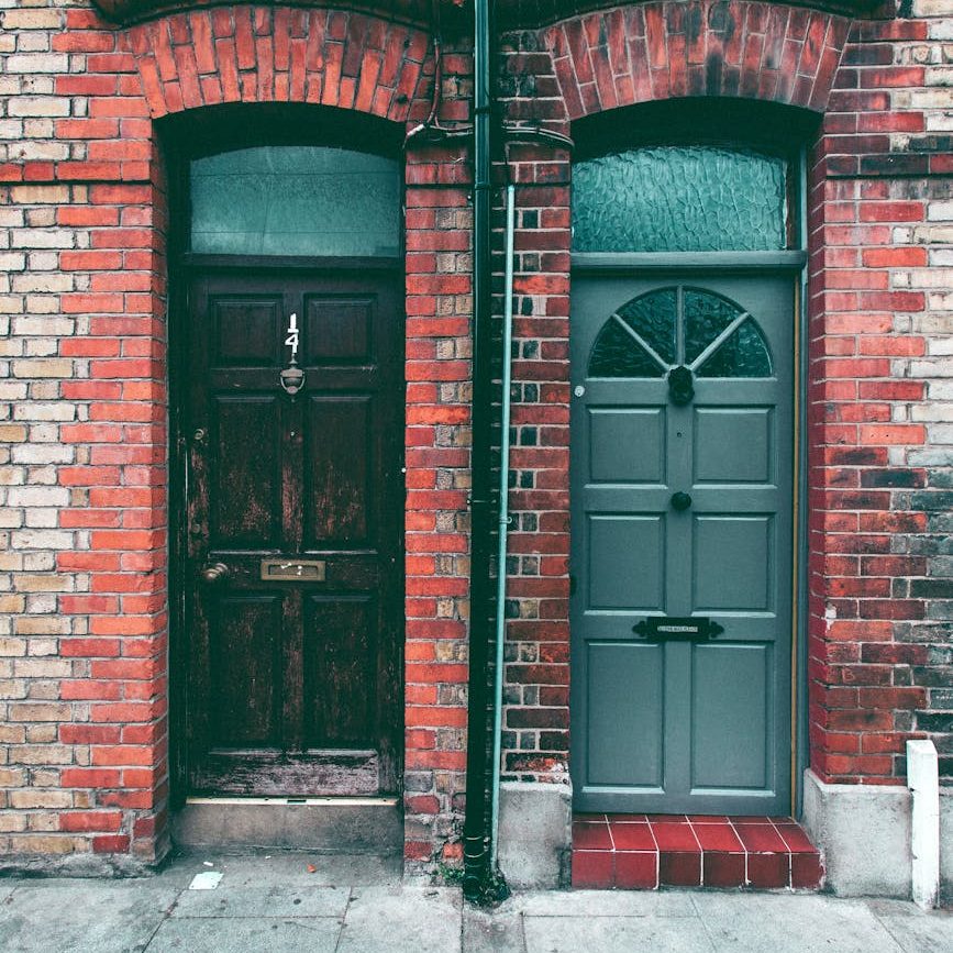 The front doors of two terraced houses (wallflowerhaze.com)